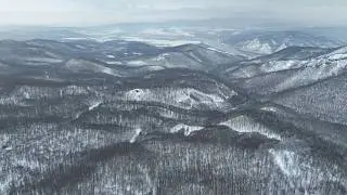 Winter Silence Over Snowy Hills | 4K Aerial Relaxation