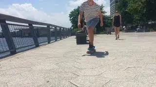 Penny board cruising  Downtown NYC