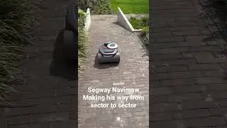 Segway Navimow H3000e making his way from sector to sector without wires and with height difference.
