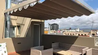 TOLDO MARINO INSTALADO EN UN ÁTICO EN BARCELONA