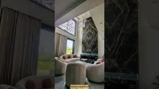 Double Height Living Room Design with Bookmatch | ATD | Best Architects in Noida & Greater Noida