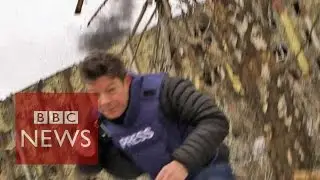 Ukraine: Fleeing artillery fire during ceasefire