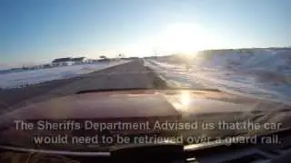 Lifting a car over a guard rail