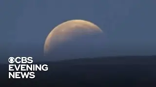 Super flower blood moon dazzles stargazers