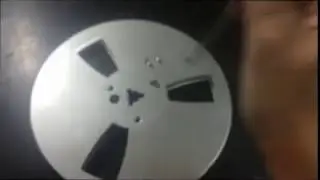 Vaciar la cinta de un carrete de bobina abierta. Remove tape from a Reel