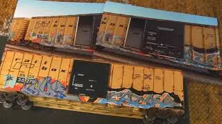 APPLYING Safety strips to a Railbox Boxcar.