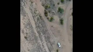 Car driving through Wadi Al Disah in Tabuk Saudi Arabia