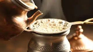the process of making the chai: grinding spices, boiling milk, filtering, and serving the chai.