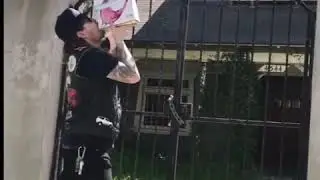 Drinking Franzia Boxed wine in front of Danzig house.