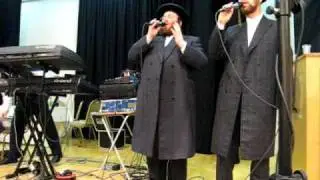 tzaly gold and joel horowitz at a wedding in london