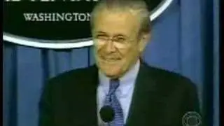 Donald Rumsfeld's Hands at a press conference