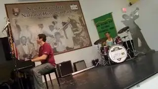 Drumming on stage at New Orleans Jazz National Historical Park