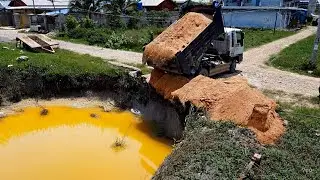 Completed Project Landflooded by bulldozer & dump truck uploading soil