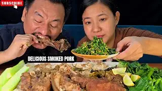 EATING DELICIOUS  SMOKED PORK WITH AXONE AND SPICY CHIVES CHUTNEY 😋