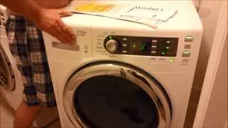 GE washer GFWS 1500 with shipping braces still connected, 