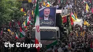 Crowds fill streets of Tehran for mass funeral of Hamas leader