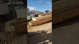 Unloading Trusses on Rolloff Trailer