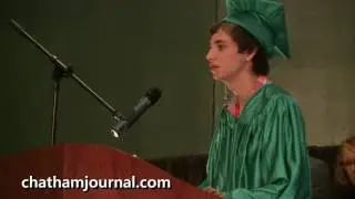 Logan Perschy speaks at the 2017 Woods Charter School graduation