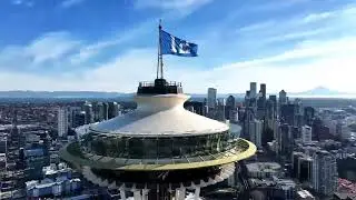 KIRO 7 Drone at Space Needle for raising of 12 flag for Seattle Seahawks