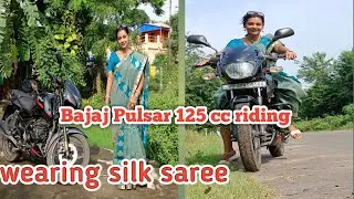 Bajaj Pulsar 125 cc riding by woman wearing silk saree/ bike riding
