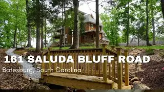 Breathtaking views and a top-of-the-line theater in this STUNNING custom home on Lake Murray