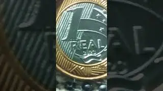 moeda de 1 real ano 2023 com anomalia rabiscado no recesso. deixe &oacute; 👍 &eacute; escrever no canal.