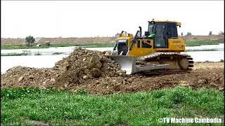 Extreme techniques wheel loader skills operator phusing and dozer grading gravel