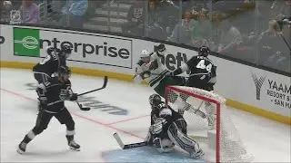 MIkey Anderson gets a shoulder check on Matt Boldy.