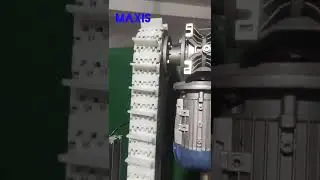 Vertical cleated belt conveyor for Bearing rings Roller auto components .