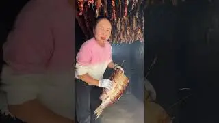 Farmers making smoked fish