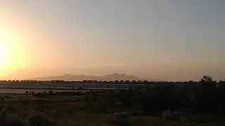 Chasing a Union Pacific double stack train to the causeway