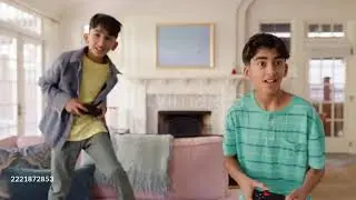 Teenage Brother's playing video games together in their living room. - HD stock video