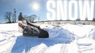 Snow Plowin' Bobcat MT100