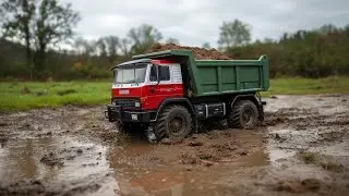 RC Dump Truck Hauling Dirt in Muddy Off-Road Action! 🚜💦