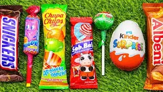 Most Asmr popular candys some lots of colorful rainbow lollipop candy unpacking chocolate eat