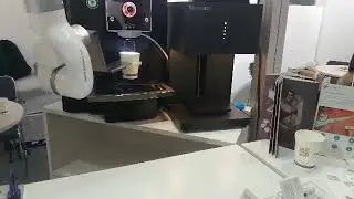 Evebot in Action with Robotic Arm
