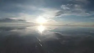 drone flight dji fpv over salar de unyuni at sunset