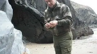 Lighting a fire with Flint & Steel.