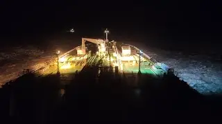 Ship passing through ice near ust luga, gulf of Finland at night  ll Timelapse ll