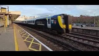 444013 & 444036 passing Surbiton with a Portsmouth Harbour service