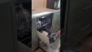 Panel-ready dishwasher with Swedish Door front in an IKEA kitchen, installed by European Kitchens