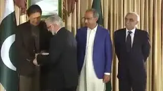 Prime Minister Imran Khan distributing sales and income tax refund cheques among prominent exporters