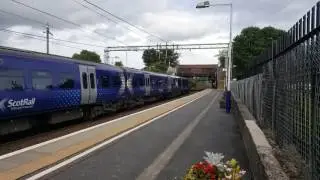 334010 Departing Yoker Whilest 334017 & 334006 pass at speed