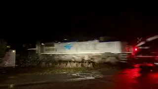 Amtrak 53 With a Dash 8 in a December Snow Flurry