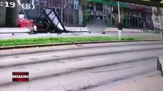 WATCH: Car crashes into pedestrian at bus shelter