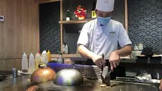 Male Chef Cooking in Teppanyaki Restaurant @ NEX 3