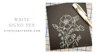 White Uniball Signo Pen on Black