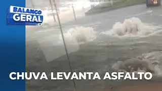 Tempestade em Curitiba: chuva levanta asfalto no Centro; força da água arrastou caçamba no Xaxim