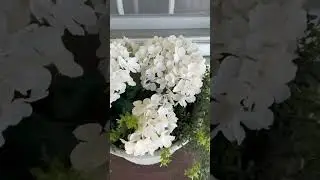 How to style faux flowers on your porch! #homedecor #farmhousedecor #diy
