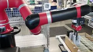 Sawyer Robot interacting with MiR mobile robot to load fixture